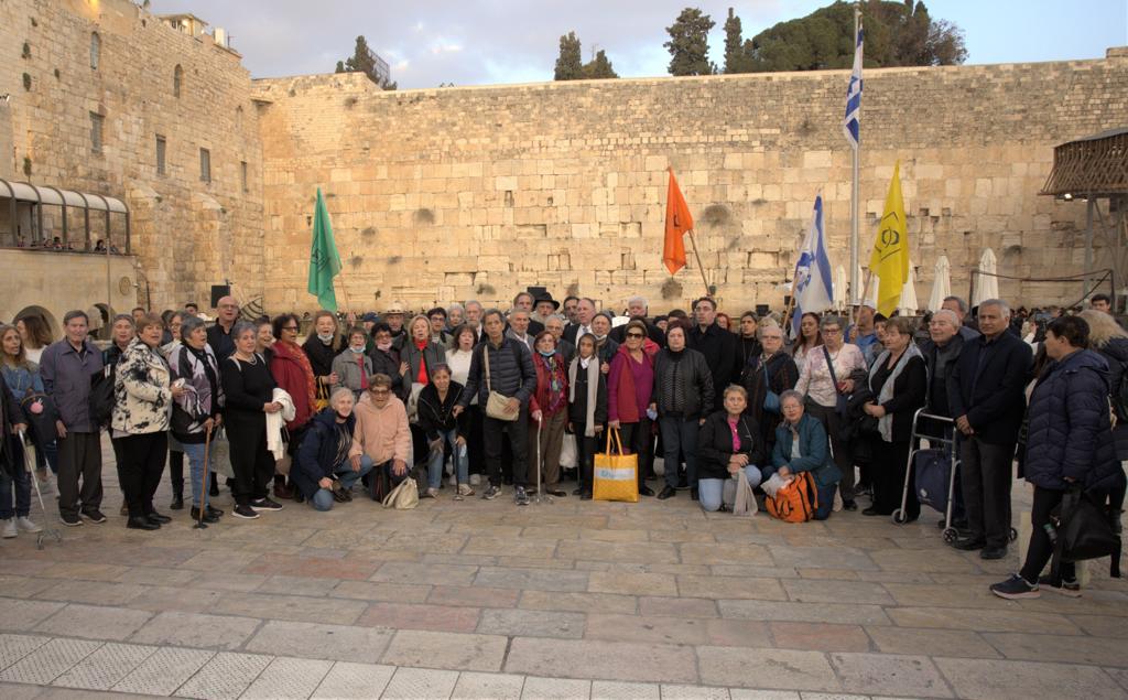 Exciting 150 Holocaust survivors came to light candles at the Western